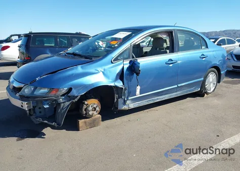 2009 Honda Civic Hybrid from USA, damaged, VIN JHMFA36239S009356